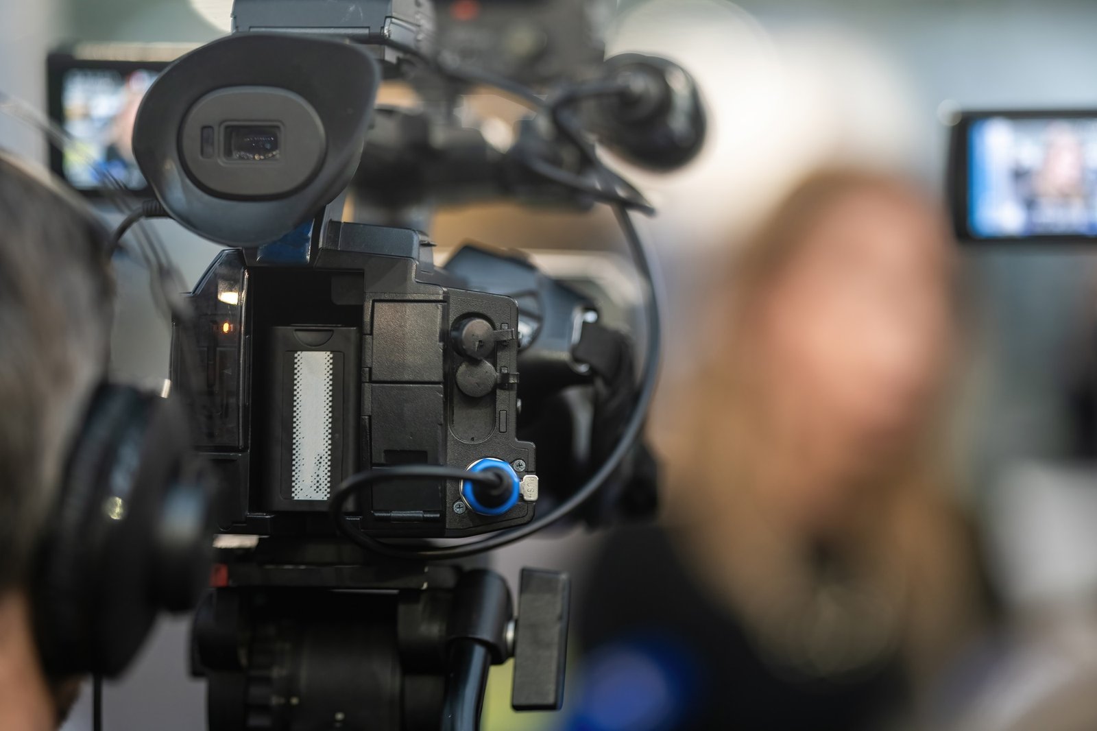Media camera stands poised, capturing the dynamic energy and captivating details of an event.